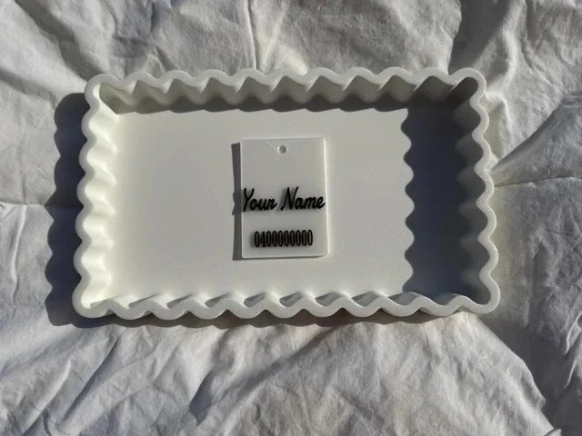 Front of a personalised luggage tag
