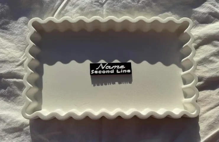 Front of a personalised magnetic name badge